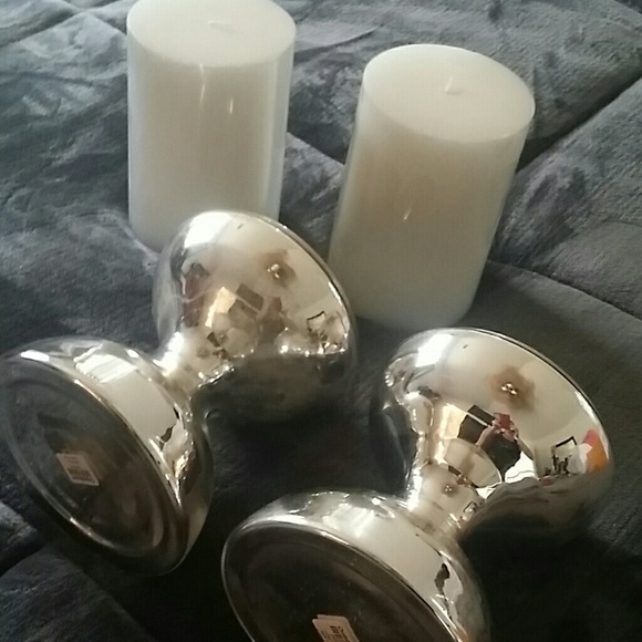 Large candles with lg silver pillars