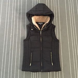 black hooded vest