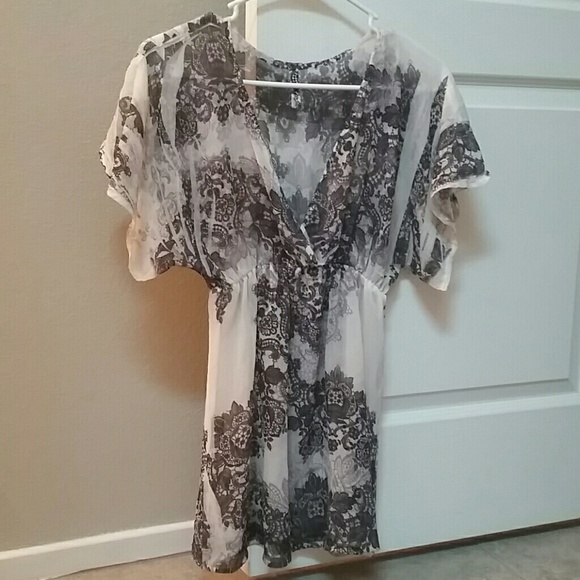 Cream and black blouse