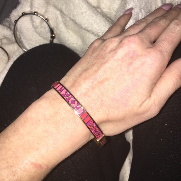 Coach bangle. Pinkish with purple