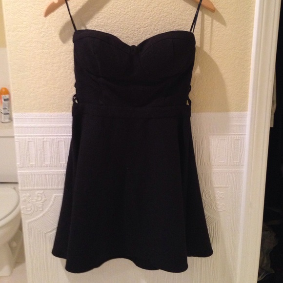 Strapless and caged back mini black dress