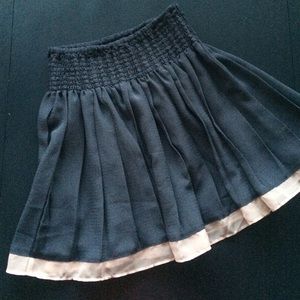 Dusty navy skirt with soft pink hem
