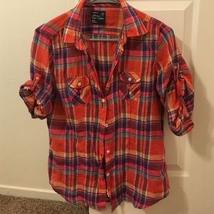 3/4 length sleeve buttoned down Blouse.