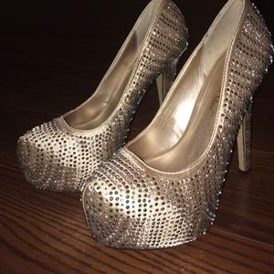 Gold heels with sequence.