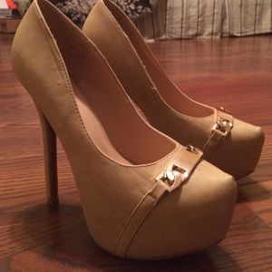 Tan heels with gold buckle