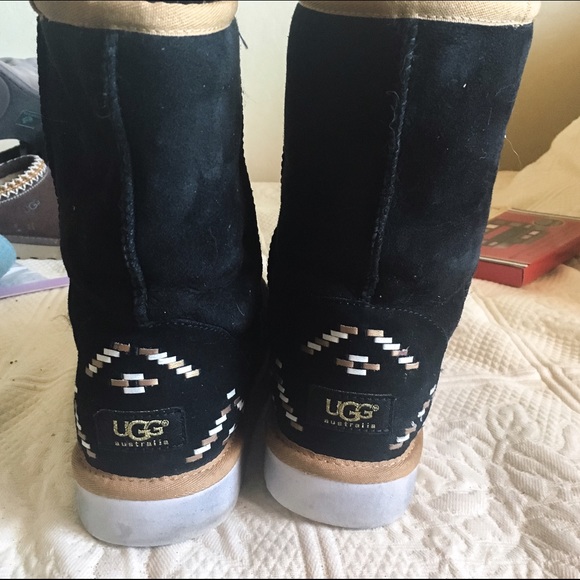 Black Uggs with brown detail. Authentic. Size 10