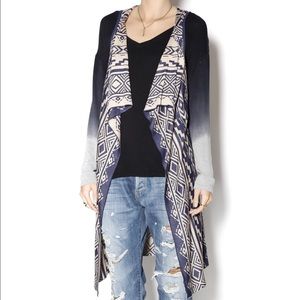 Sleeveless long vest by Blu Pepper