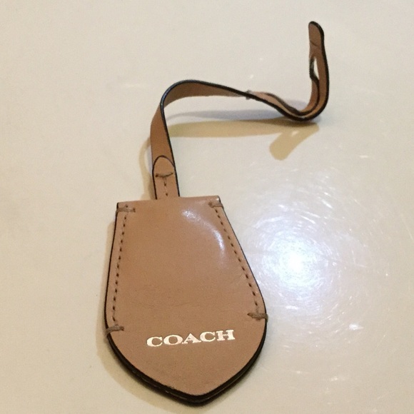 Coach Accessories - ⛔️Coach cream leather bag hang tag