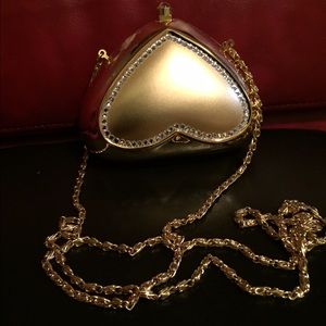 Heart-shaped Elan Vital mini-bag.