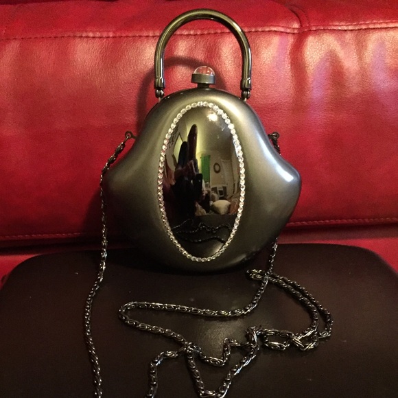 Elan Vital hard shell purses.