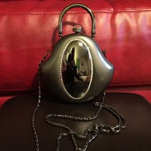 Elan Vital hard shell purses.