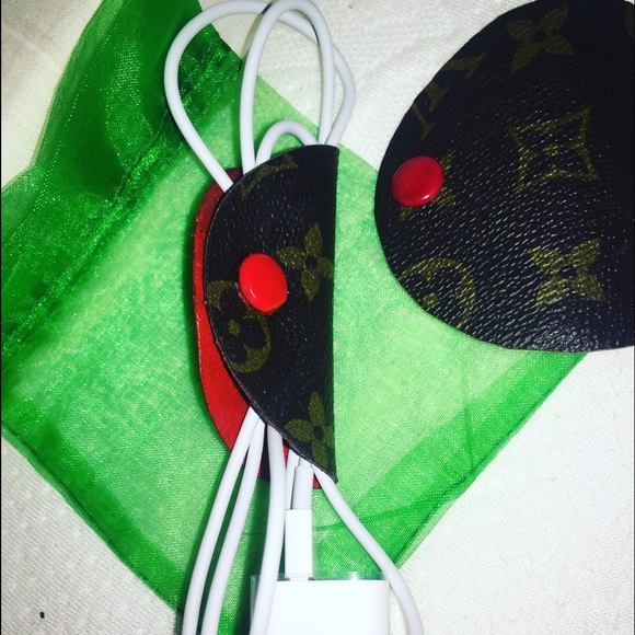 Louis Vuitton headphone/phone charger holder