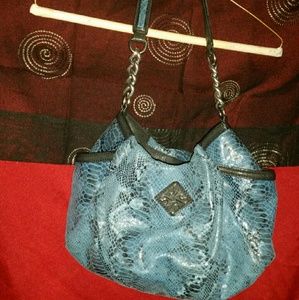 Blue leather with black edging Vera Wang purse