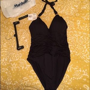 Ladies Black swim suit. Never worn.