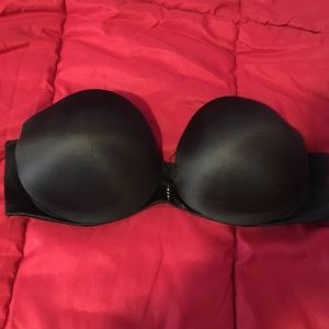 Black strapless padded push-up bra.
