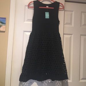 New tags. Sold Boomies $98. V neck cut outs skirt