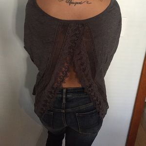 Grey top with opening in back