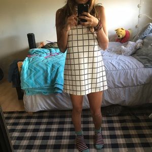 Black and white cooperative mini polyester dress