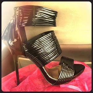 Fierce high heels in all black with gold detail!