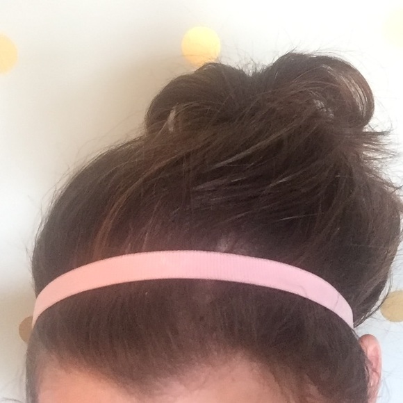 Three pink skinny under armour headbands