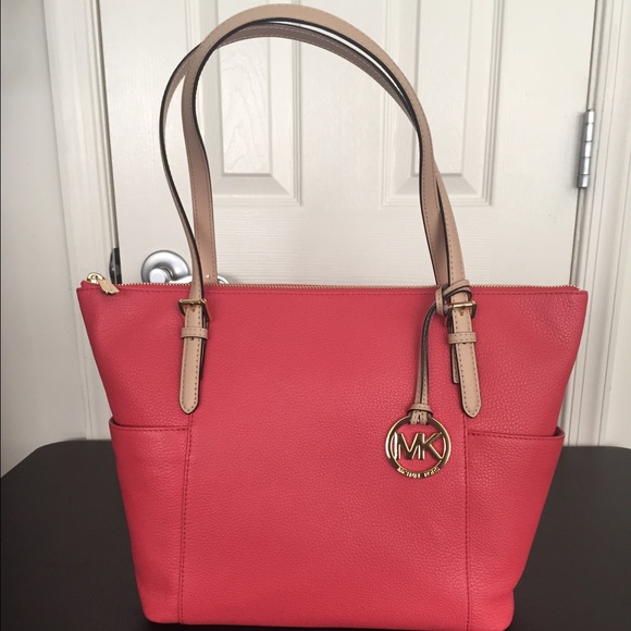 Watermelon colored Michael Kors handbag