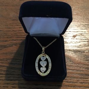 Danbury mint "I love you" necklace for daughter.