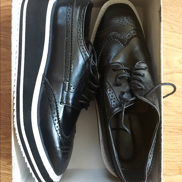 Black platform loafers