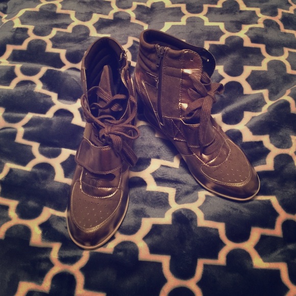 Wedge tennis shoes bronze in color, worn 3x.