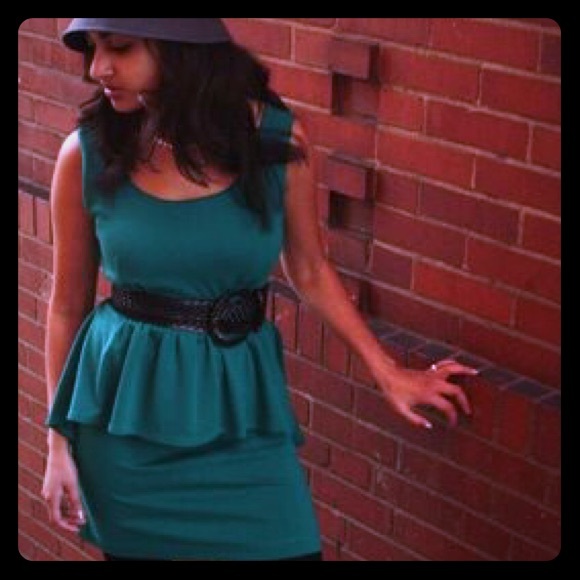 A green-teal peplum Monteau dress sold by Modcloth