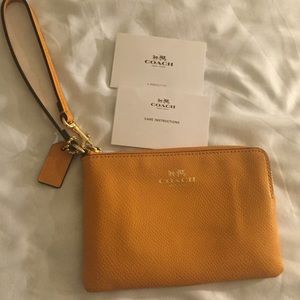 Orange coach wristlet