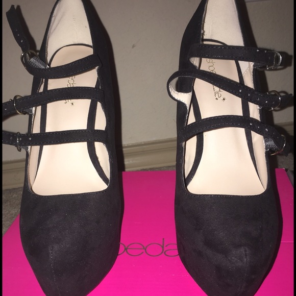 Brand new three strap black heels.