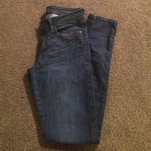 Skinny dark blue jeans
