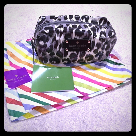 kate spade Handbags - Kate Spade animal print travel make up bag