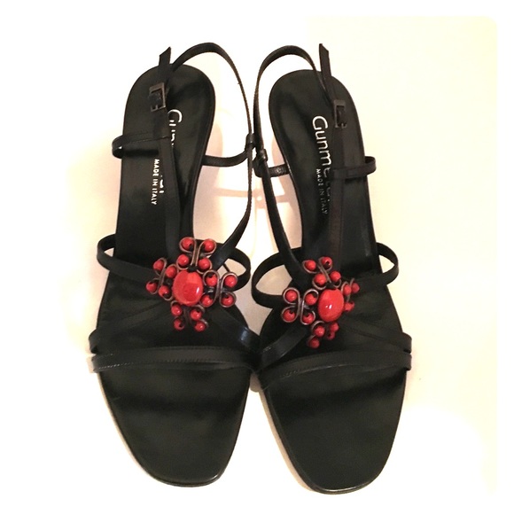 Gunmetal Sandals: Metal & Red ornamental design.