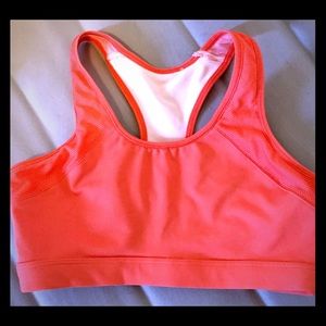 NWOT- Coral Moving Comfort sport bra - never worn