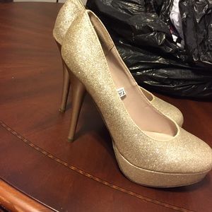 Gold high heels