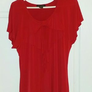Pretty red knit top with bow.