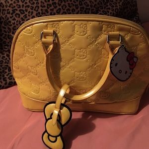 Hello kitty yellow  purse