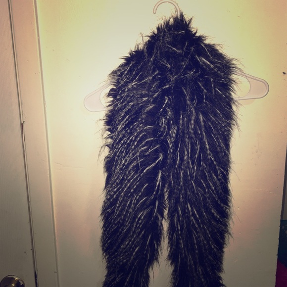 Black fury scarf with a matching purse.