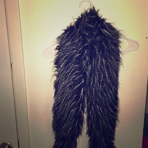 Black fury scarf with a matching purse.