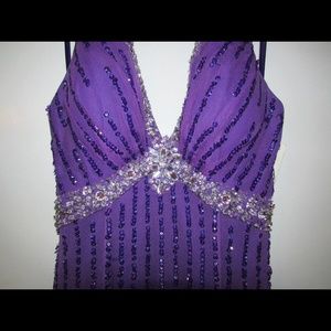 Never worn purple beaded prom gown
