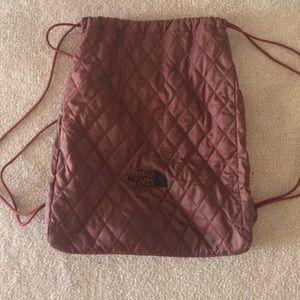 The North Face maroon draw string bag