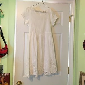 White swing dress with lace accents
