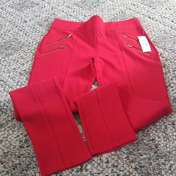 Red leggings with zipper accents