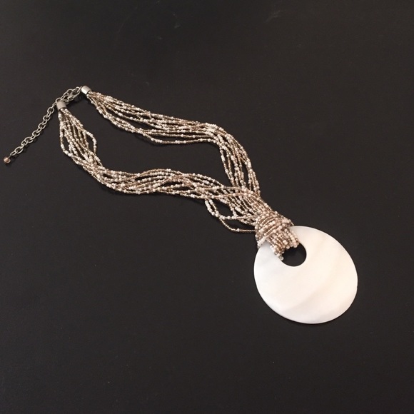 White and gold necklace