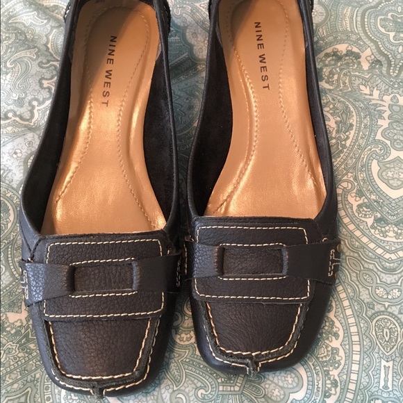 Black Nine West loafers with kitten heels.