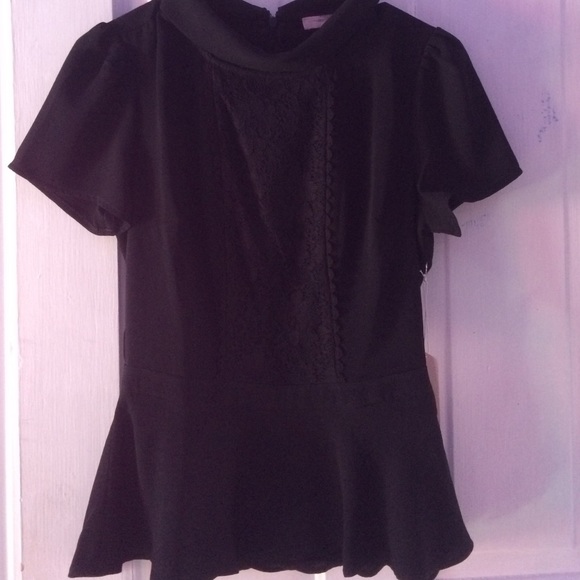 Adorable collared peplum blouse with lace detail