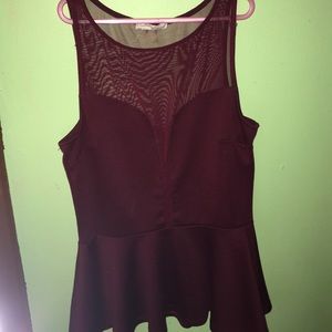 A Maroon fancy see threw shirt