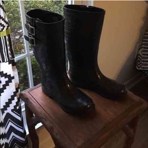 Black rain boots.