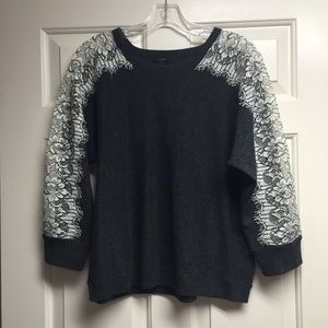 J. Crew sweater with lace detail on sleeves.